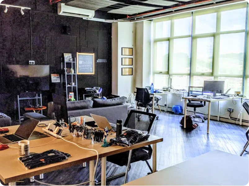 Modern office space with desks and couches